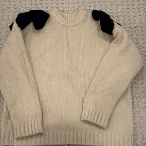 Elegant Cream Sweater with Black Accents